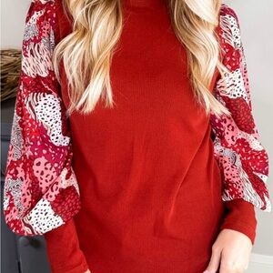 Elegant Red Blouse with Patterned Sleeves